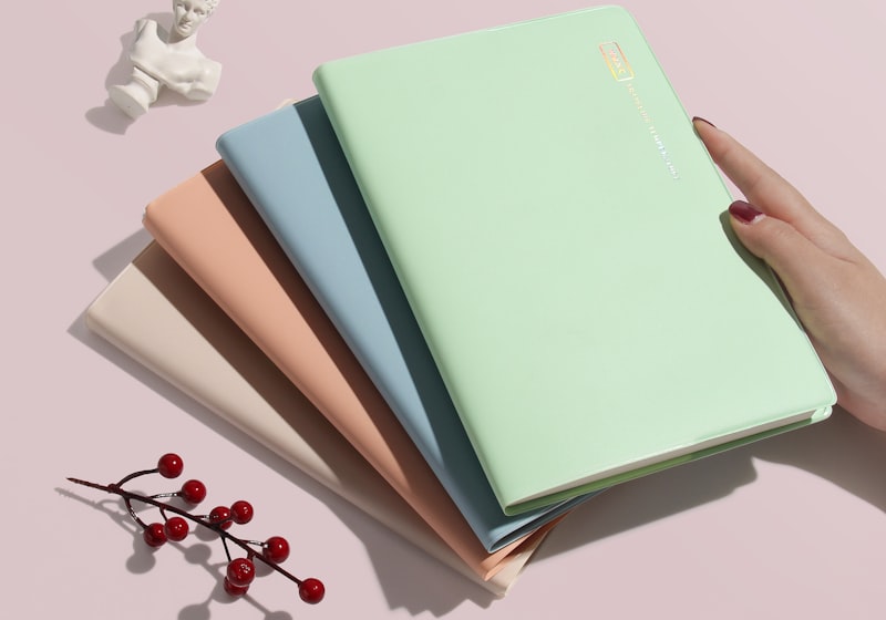 A fan of pastel notebooks