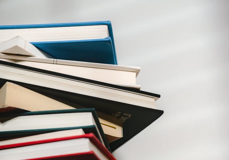 A pile of board-covered books